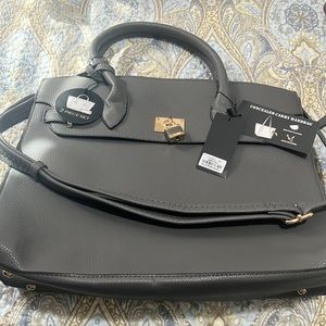 Brand new conceal and carry purse with holster and wallet. Gray.